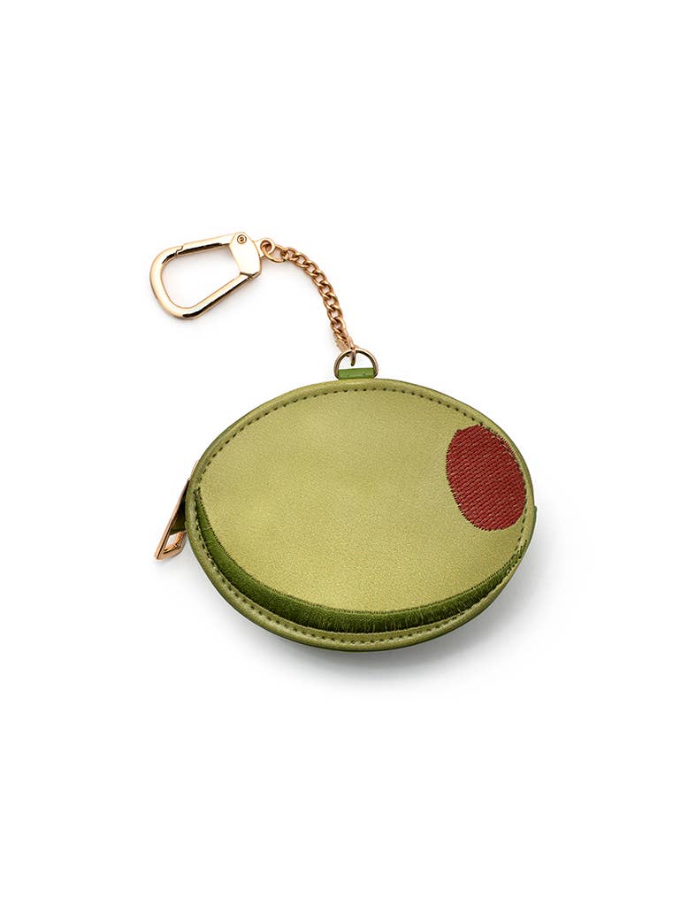 Green coin purse with a red spot on a white background