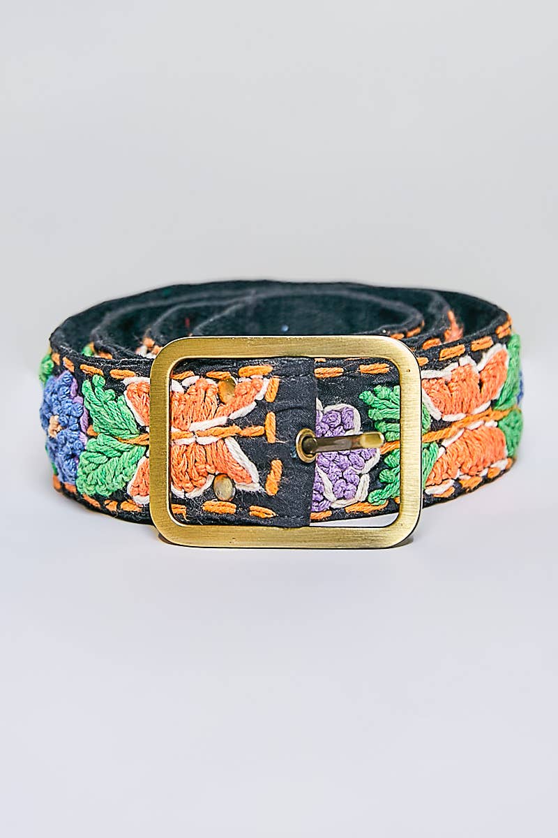 Embroidered belt with colorful floral patterns and a gold buckle on a light gray background