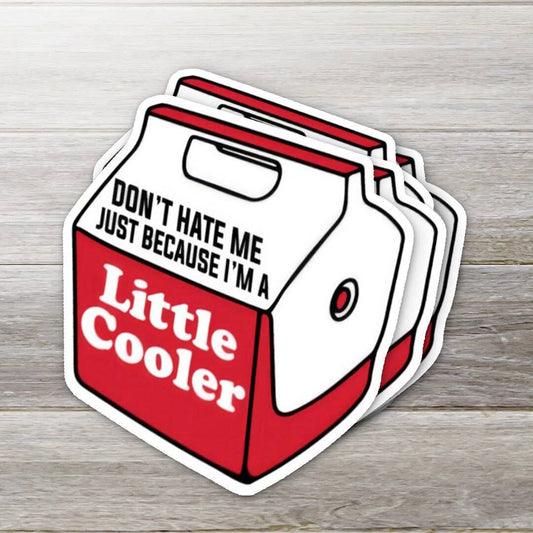 Sticker of a red cooler with text on a wooden surface