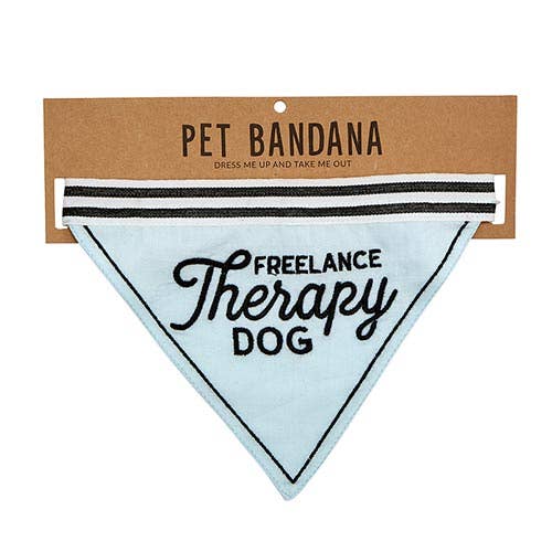 Pet bandana with 'Freelance Therapy Dog' text on a cardboard backing