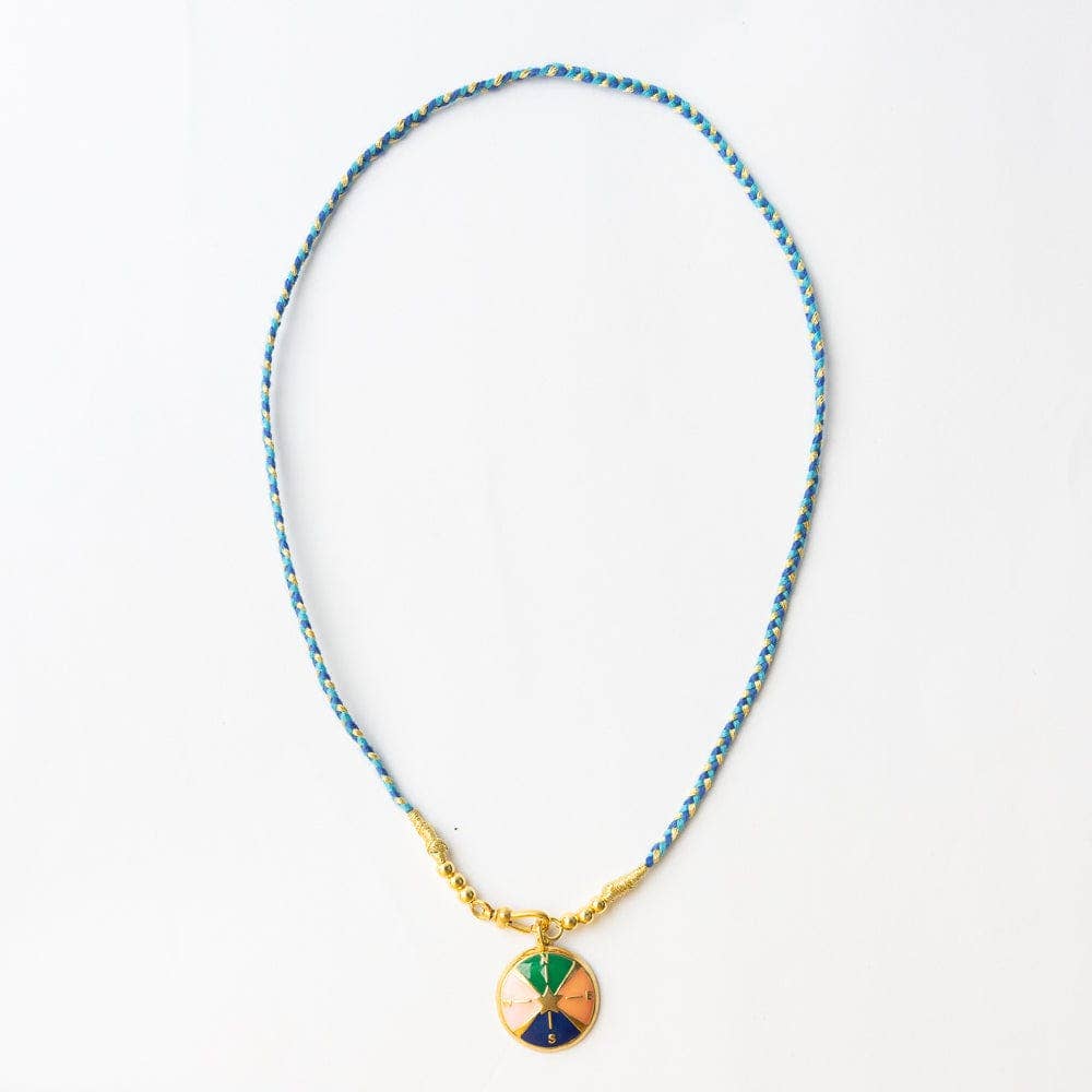 Necklace with a colorful pendant on a white background