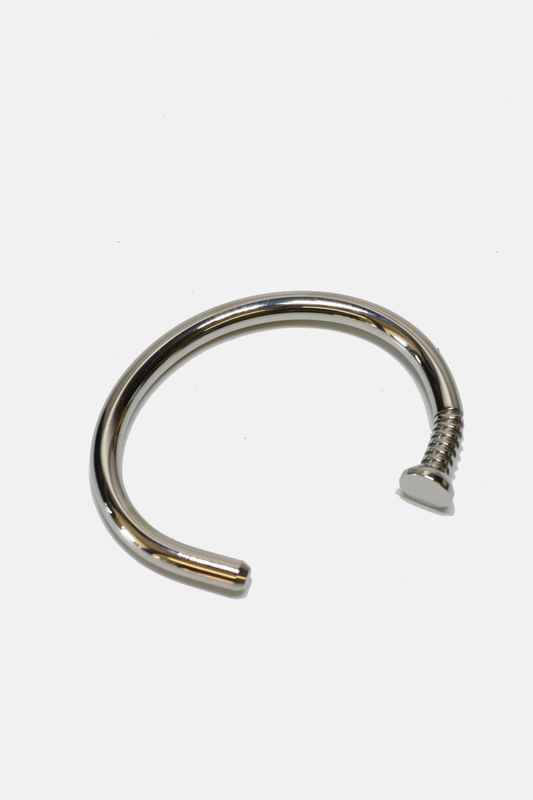 Metallic nail cuff on a white background