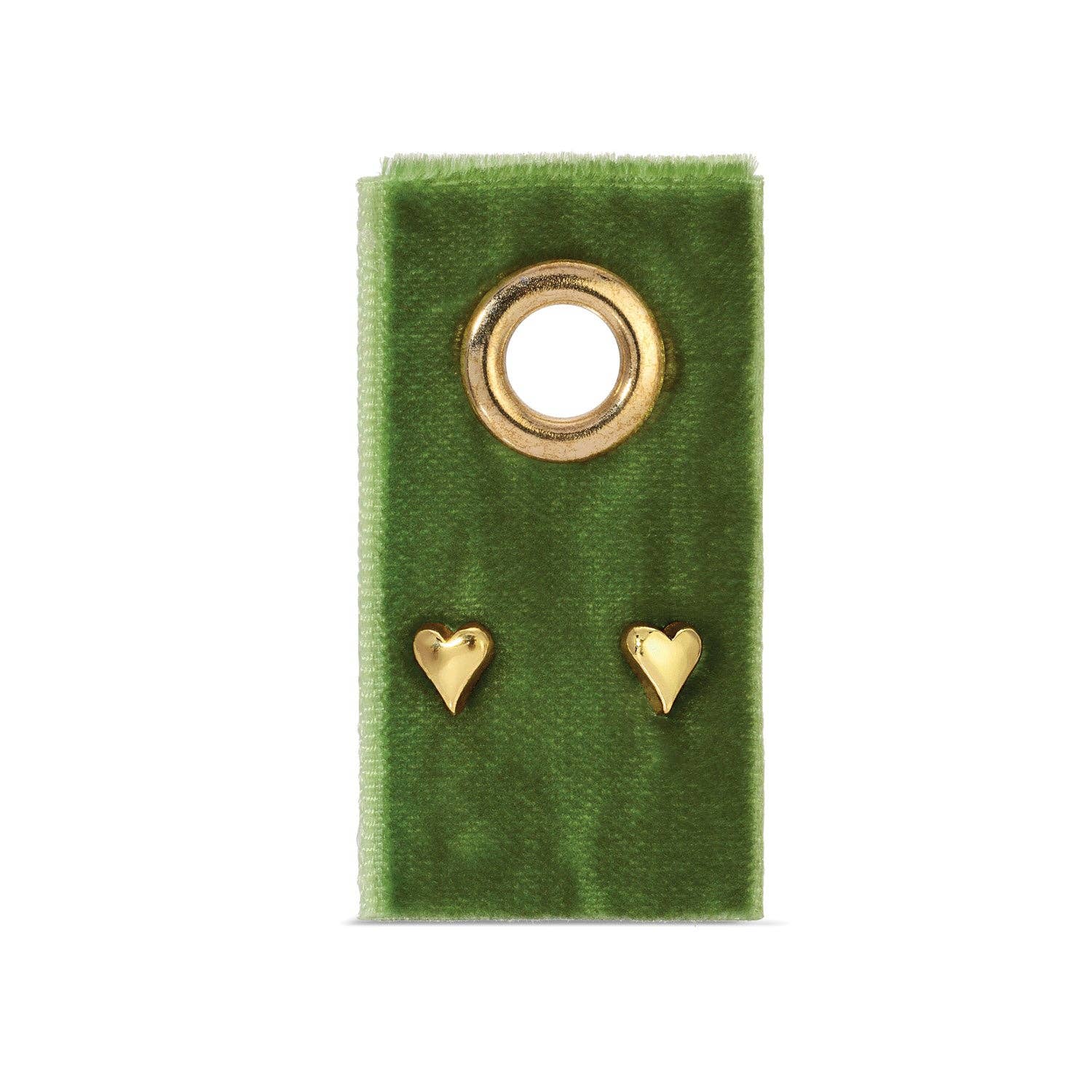 Gold heart-shaped earrings on a green velvet stand with a white background