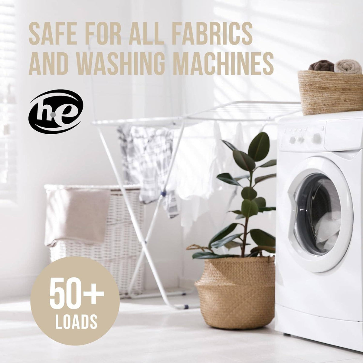 Laundry room with washing machine, plant, and text about fabric safety and load capacity.