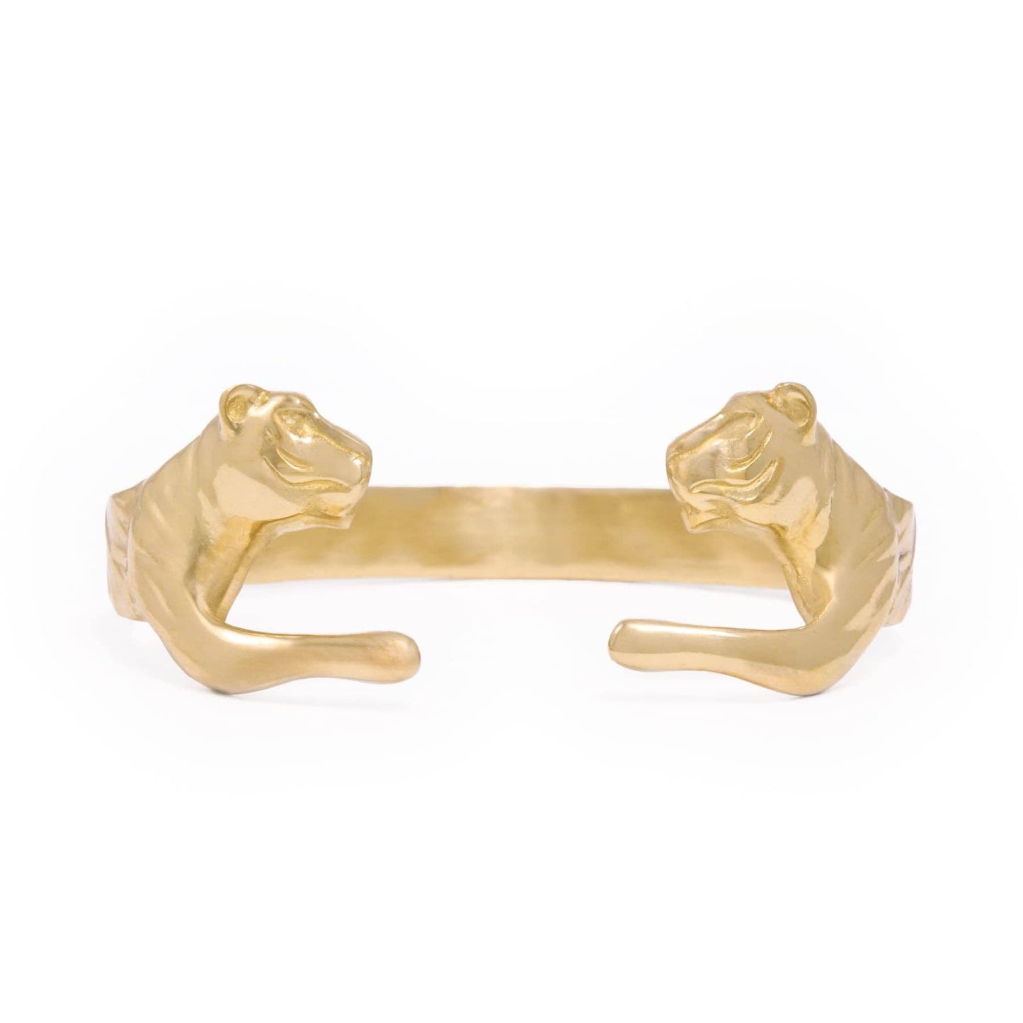 A gold-toned cuff-style bangle featuring sculpted tiger heads at each end, photographed on a clean white background.