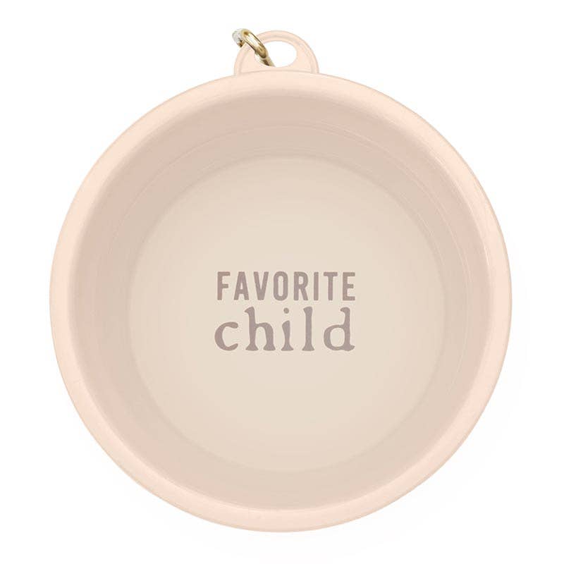 Pink ceramic bowl with 'Favorite child' text on a white background