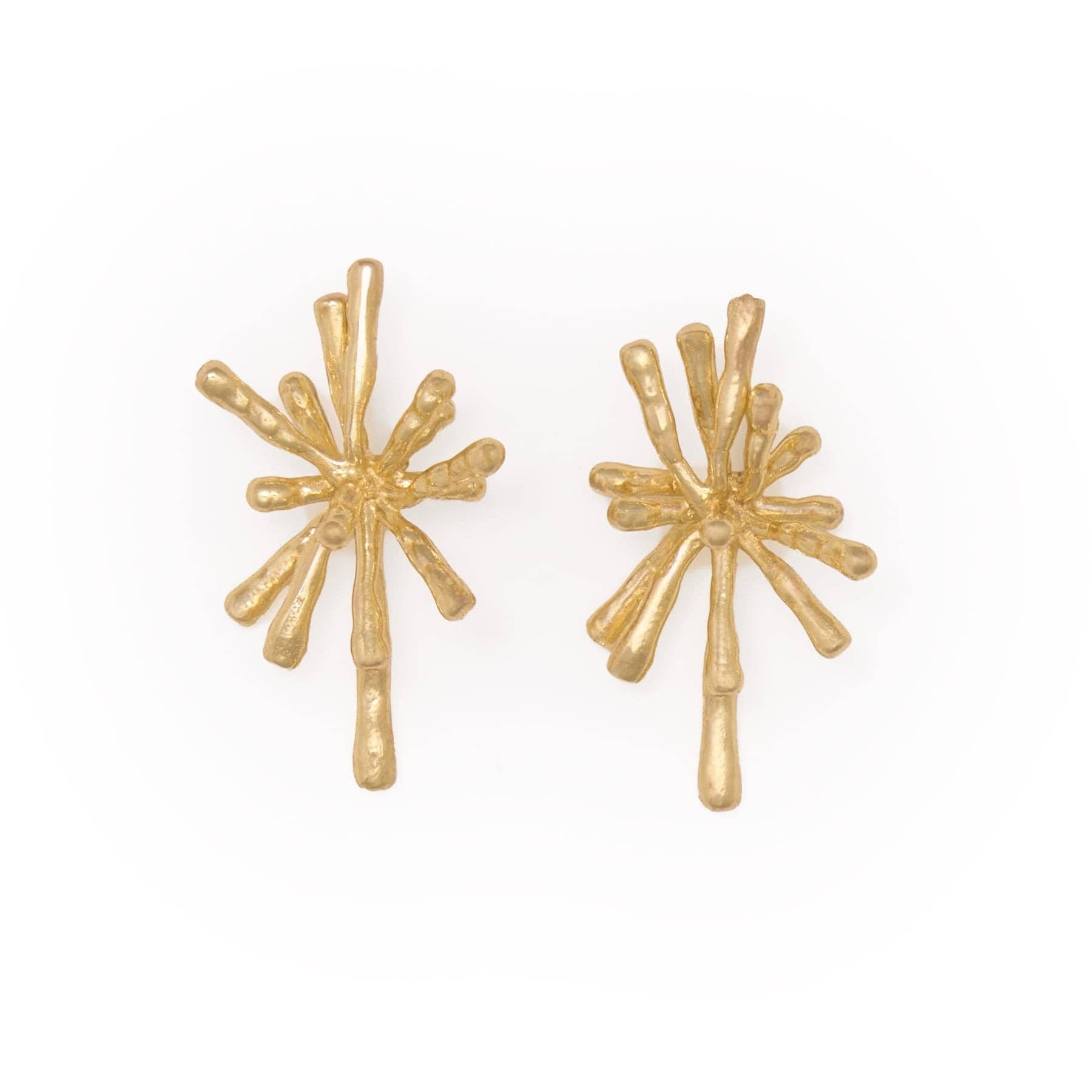 A pair of gold-toned, textured stud earrings with a starburst or firework-like organic design, shown on a plain white background.