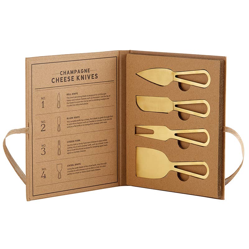 Set of gold champagne cheese knives in a cardboard holder with instructions.