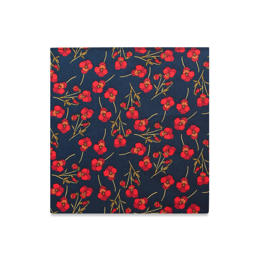 Napkin with red floral pattern on a blue background