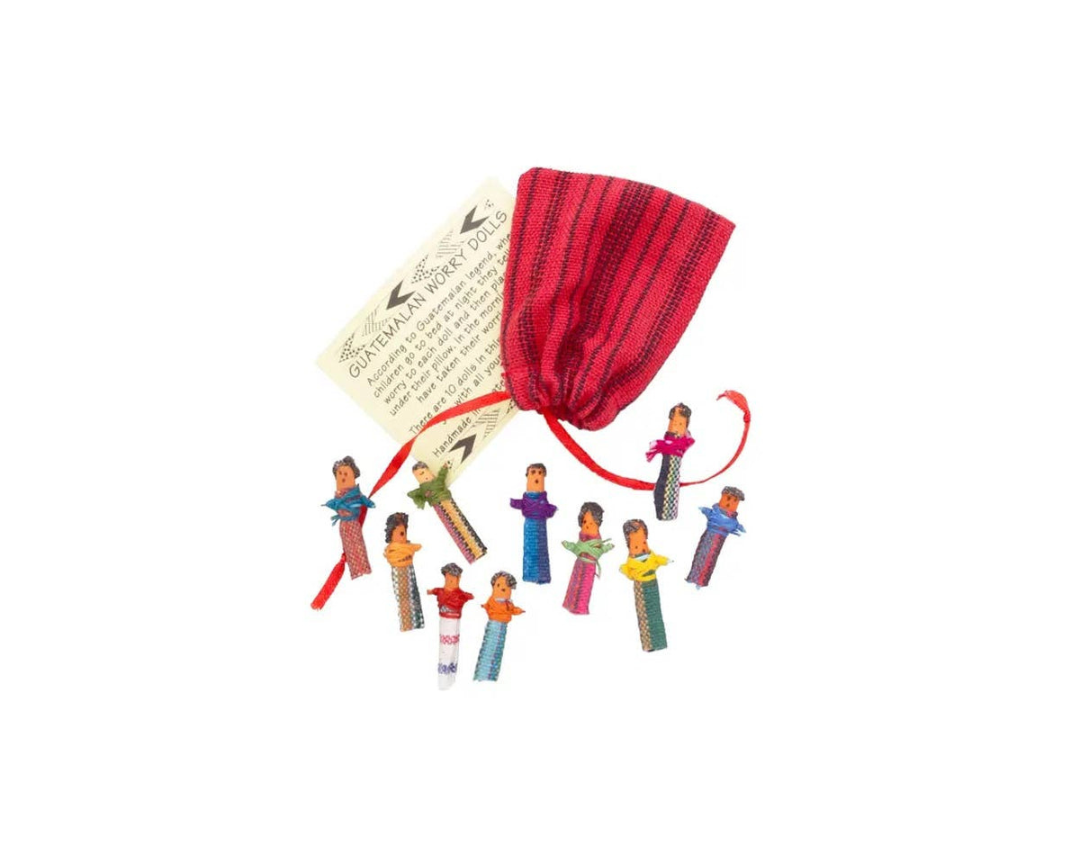 A set of miniature colorful figurines representing traditional dancers, arranged in front of a small red striped drawstring pouch with an attached product tag on a plain white background.