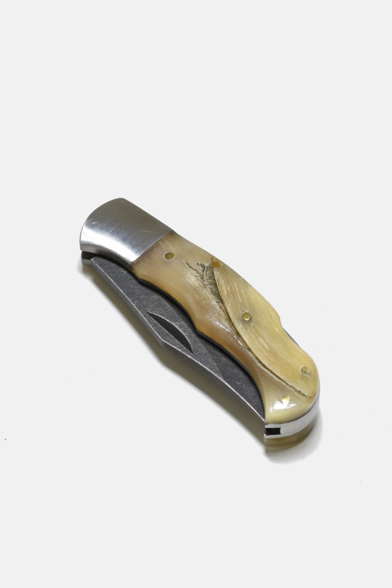 Folding knife with wooden handle on a white background