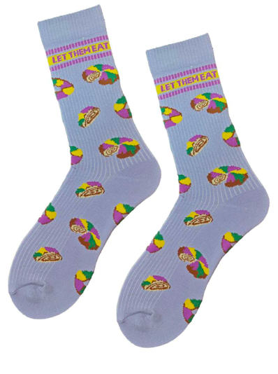 Pair of socks with colorful designs and text on a white background