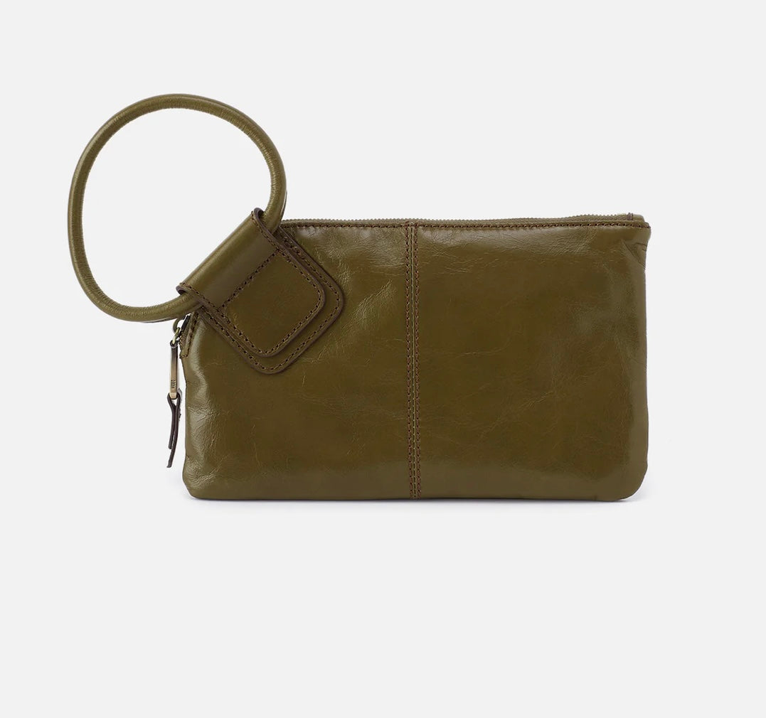 Green leather clutch with ring handle on a white background
