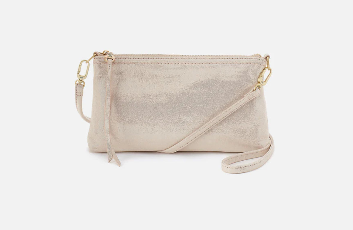 Beige handbag with a strap on a white background