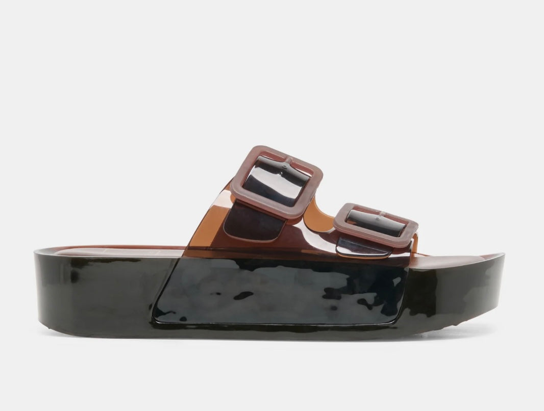Black sandal with brown buckles on a white background