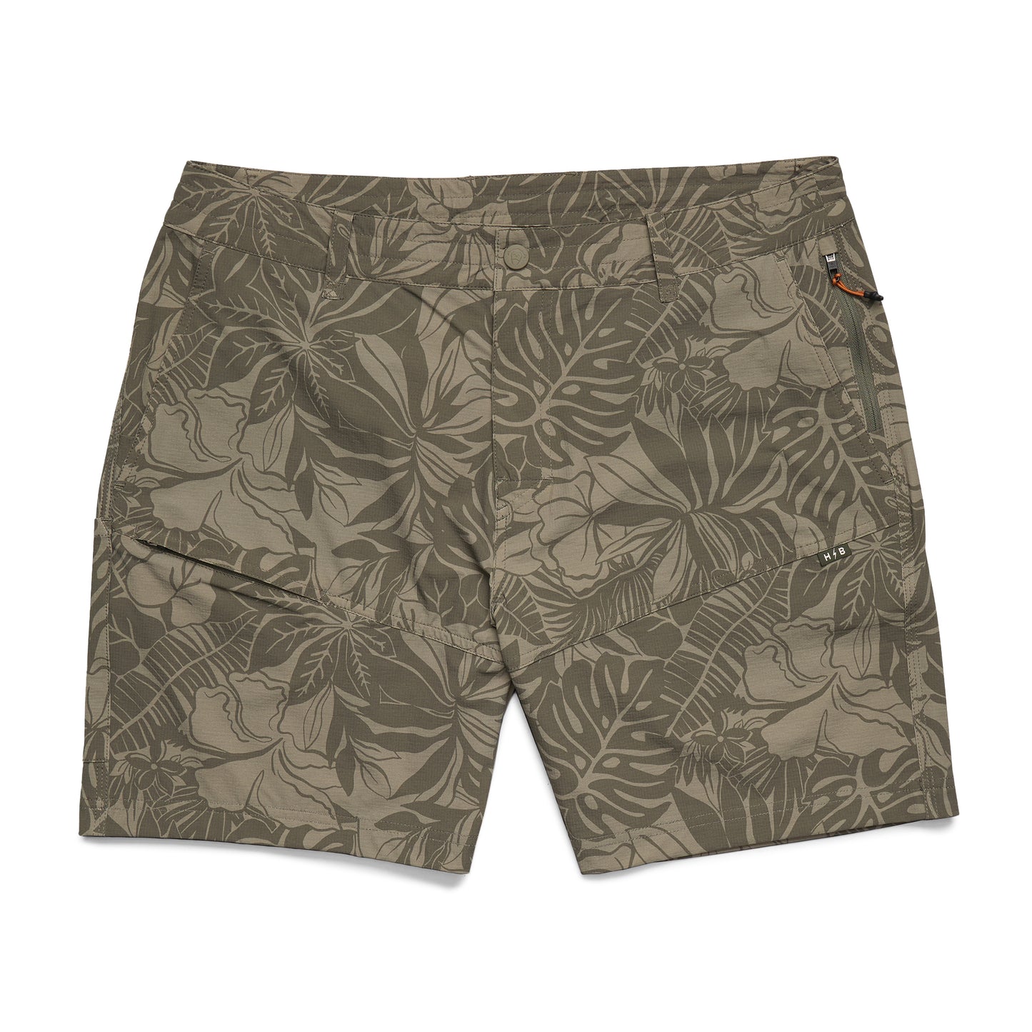 Tropical leaf patterned shorts on a white background