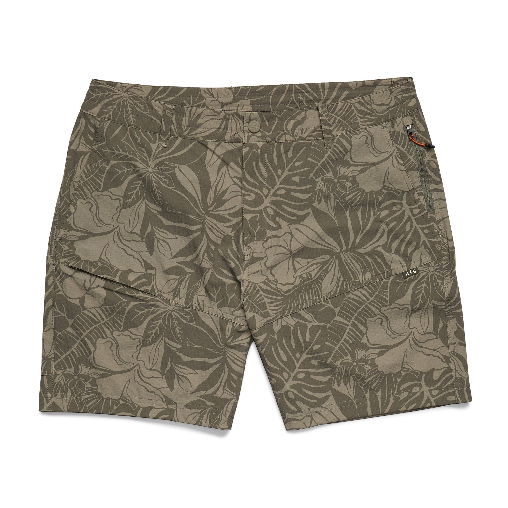 Tropical leaf patterned shorts on a white background