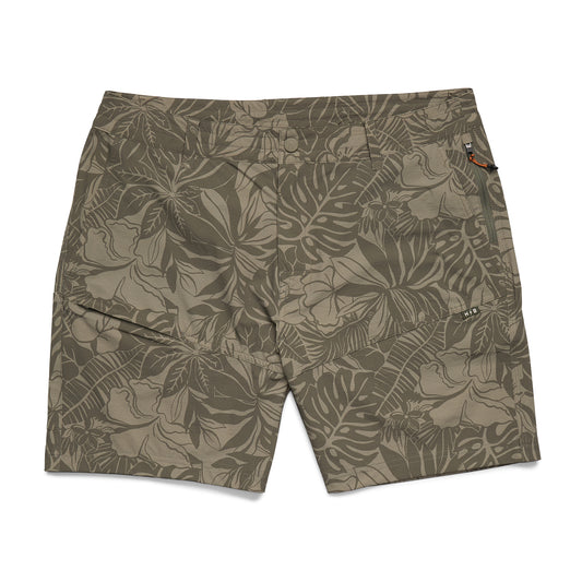 Tropical leaf patterned shorts on a white background