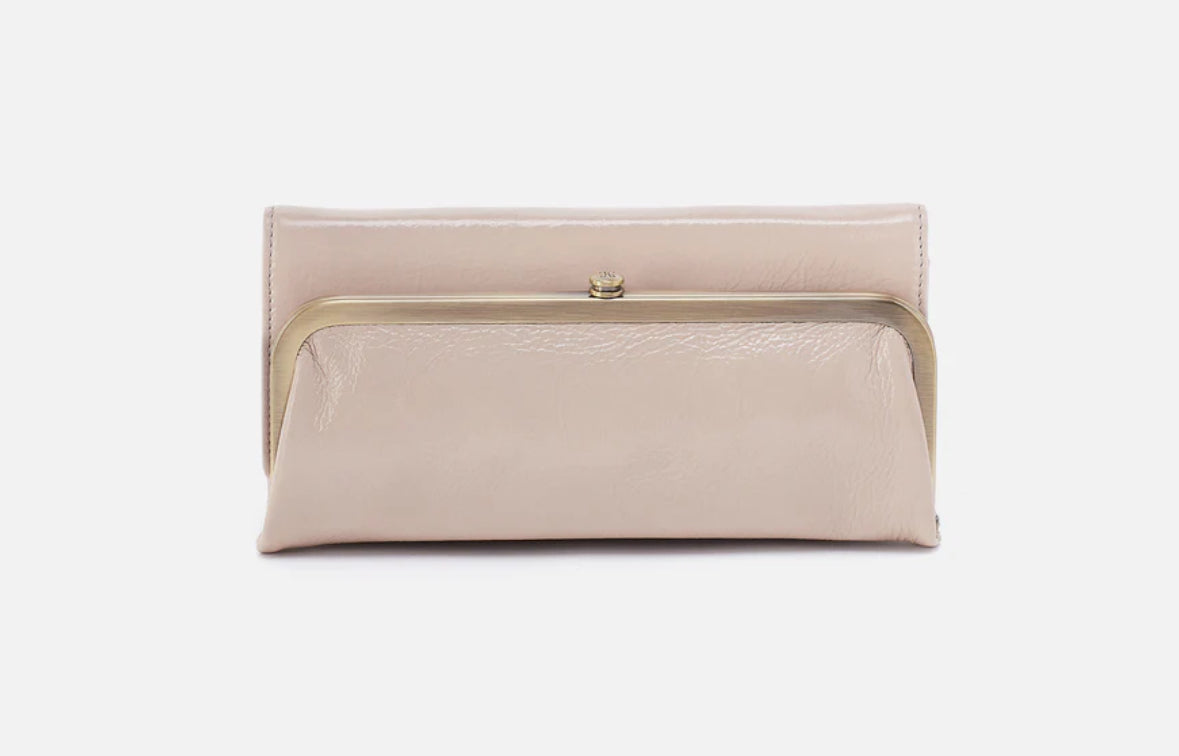 Beige clutch bag with gold clasp on a white background