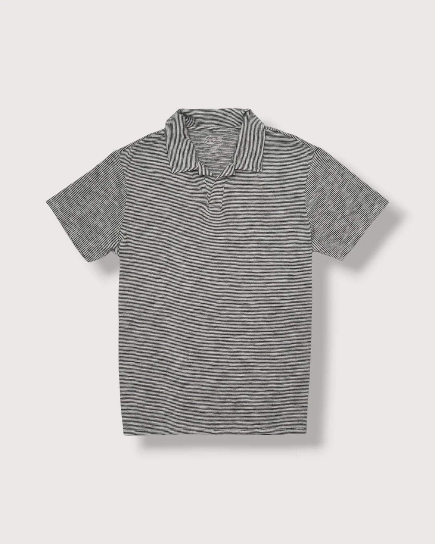 Gray polo shirt on a light gray background