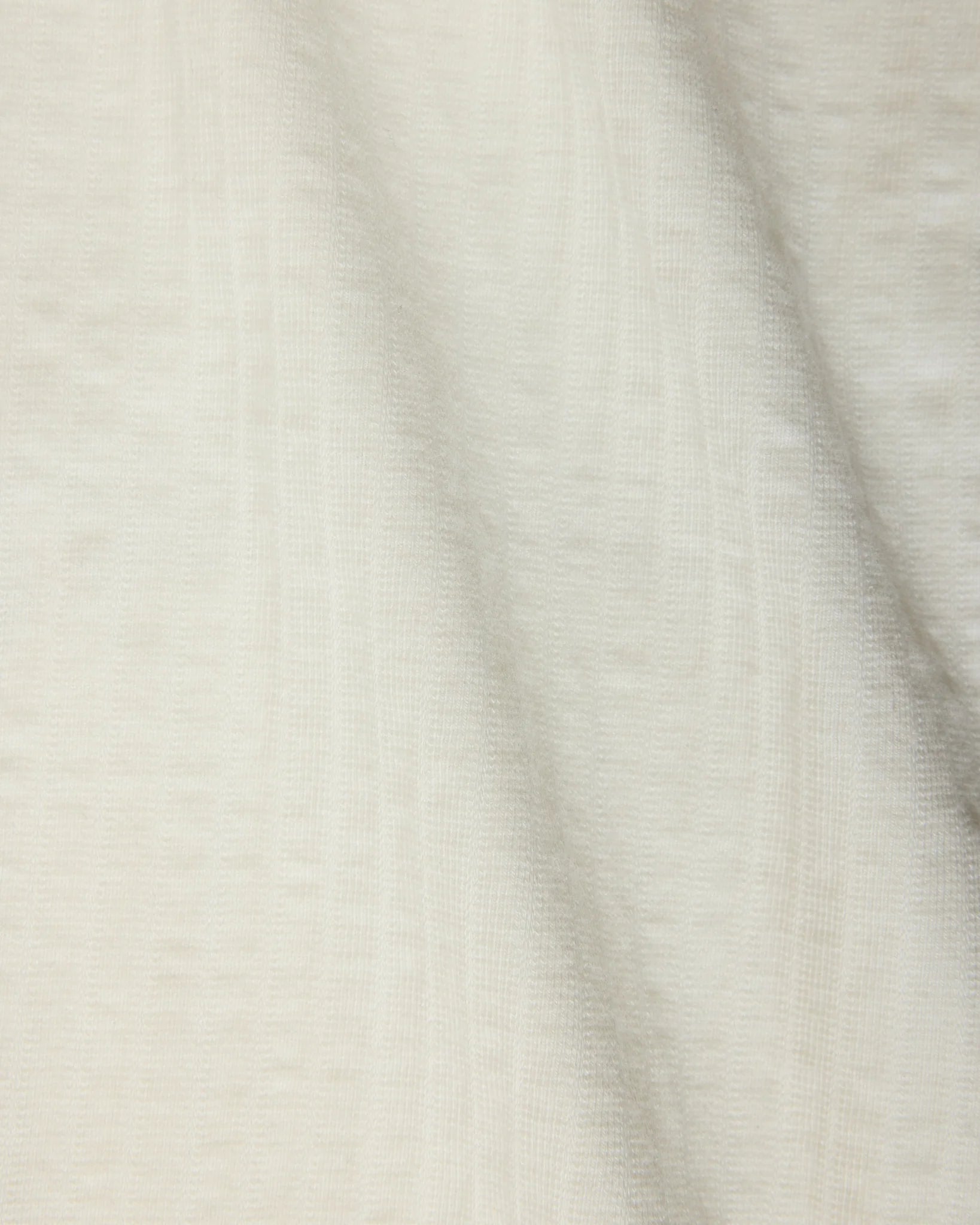 Close-up of textured beige fabric