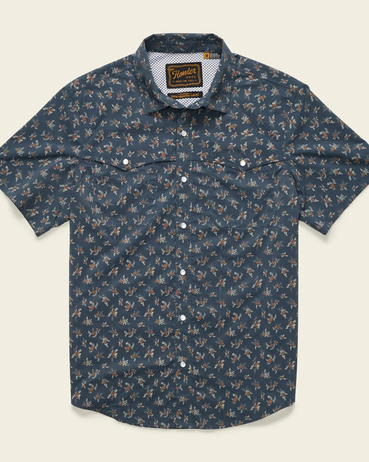Blue floral patterned shirt on a beige background