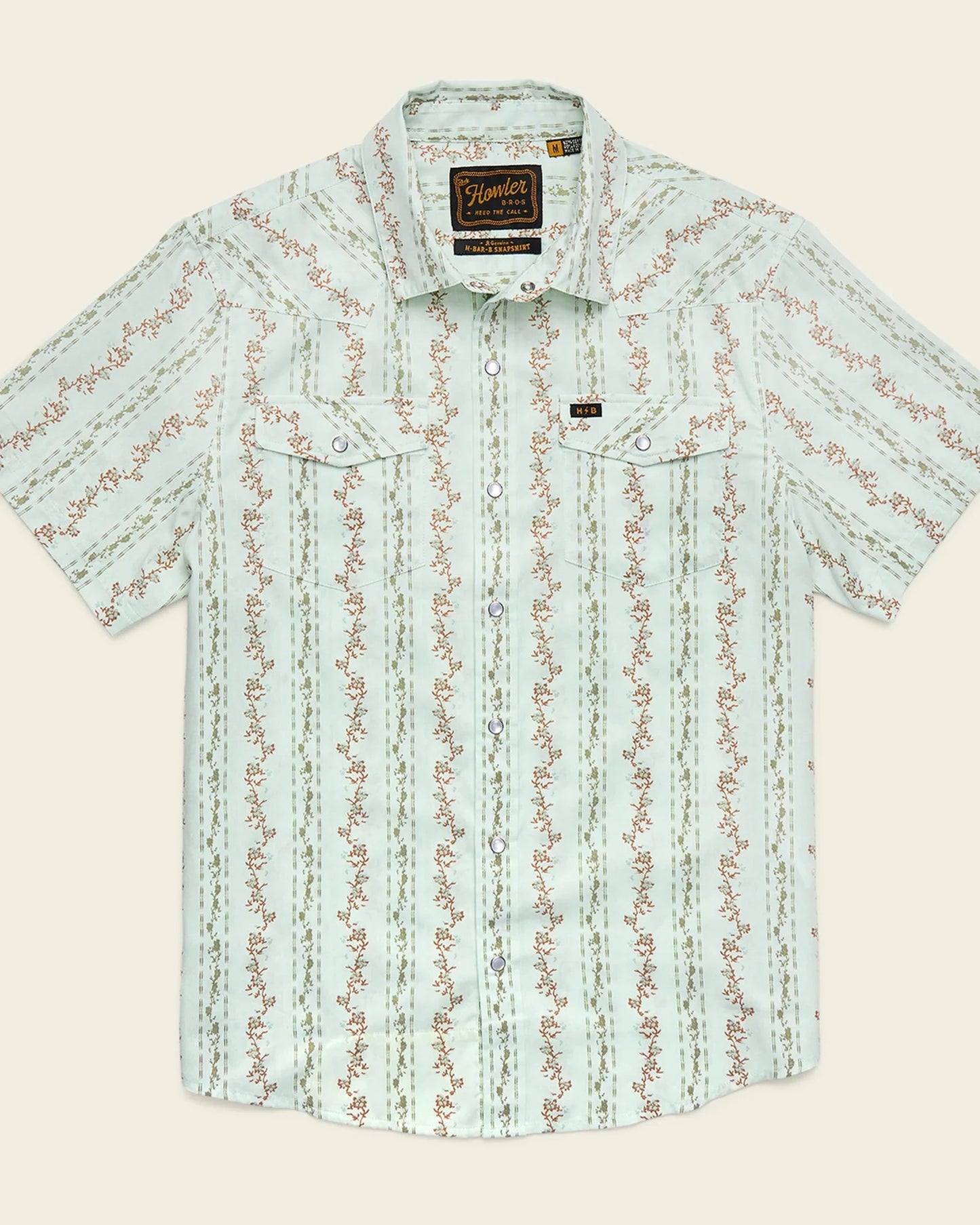 Light blue patterned shirt on a beige background