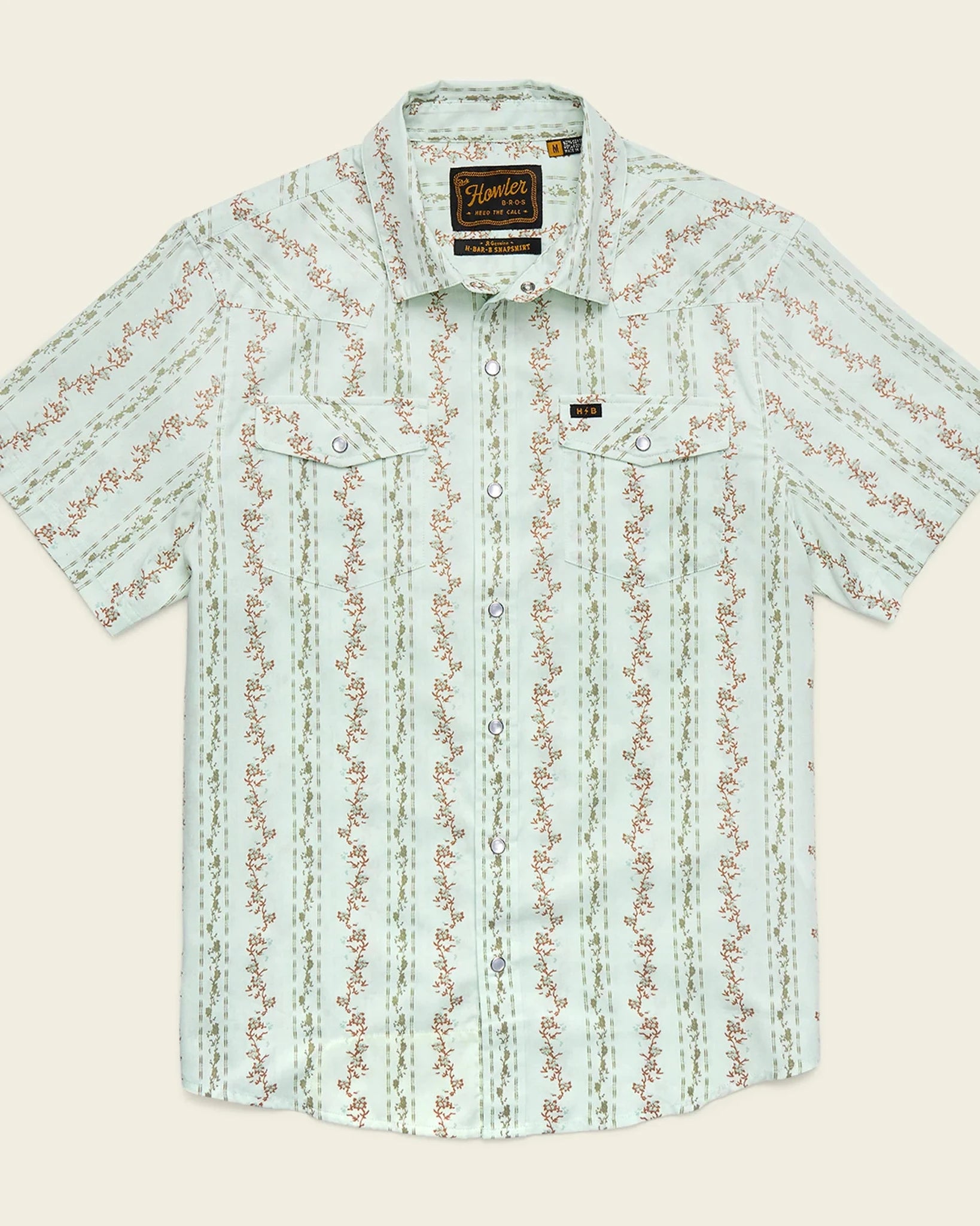 Light blue patterned shirt on a beige background