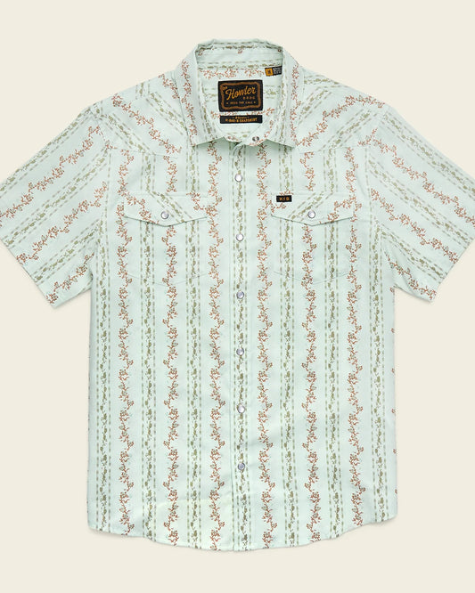 Light blue patterned shirt on a beige background
