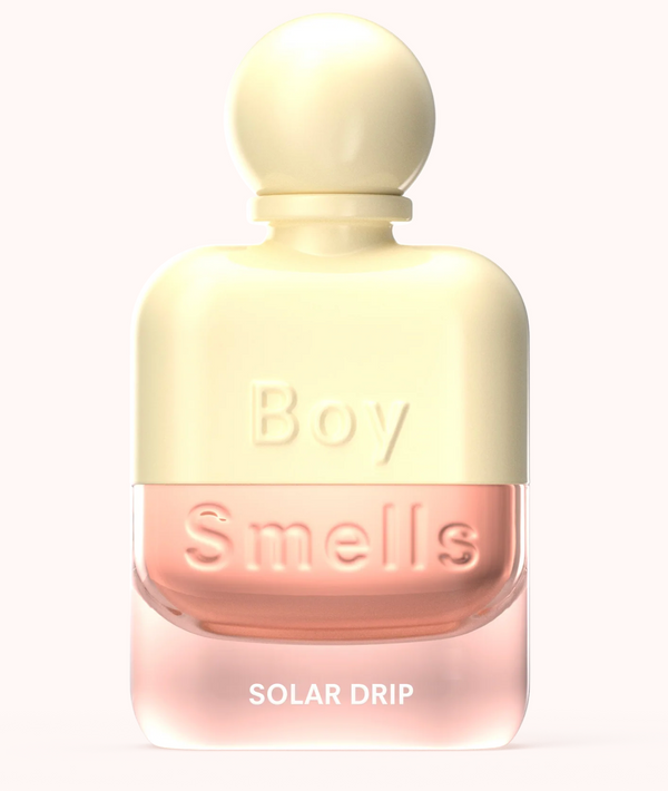 Perfume bottle labeled 'Boy Smells Solar Drip' on a white background