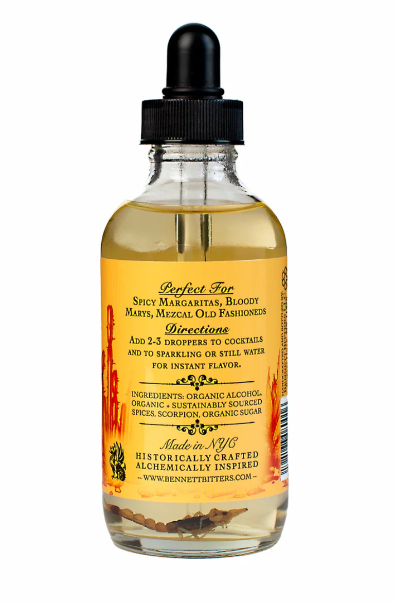 Bottle of cocktail mixer with label on a white background