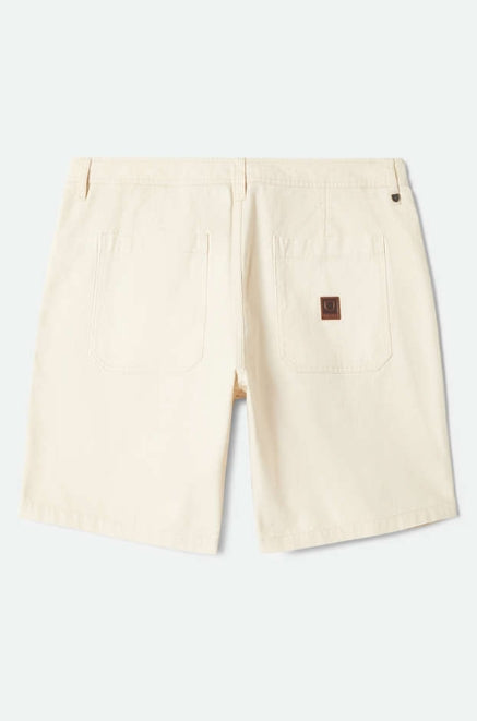 Beige shorts on a white background