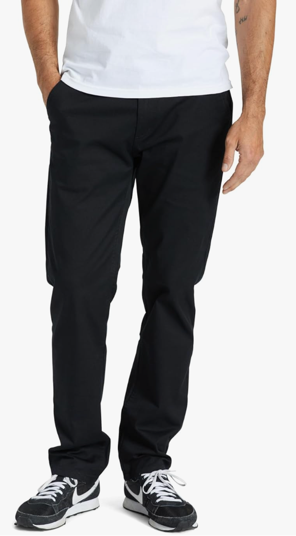 Person wearing black pants and a white shirt on a white background