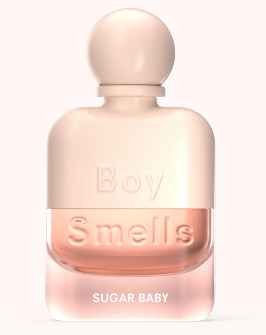 Perfume bottle labeled 'Boy Smells Sugar Baby' on a white background