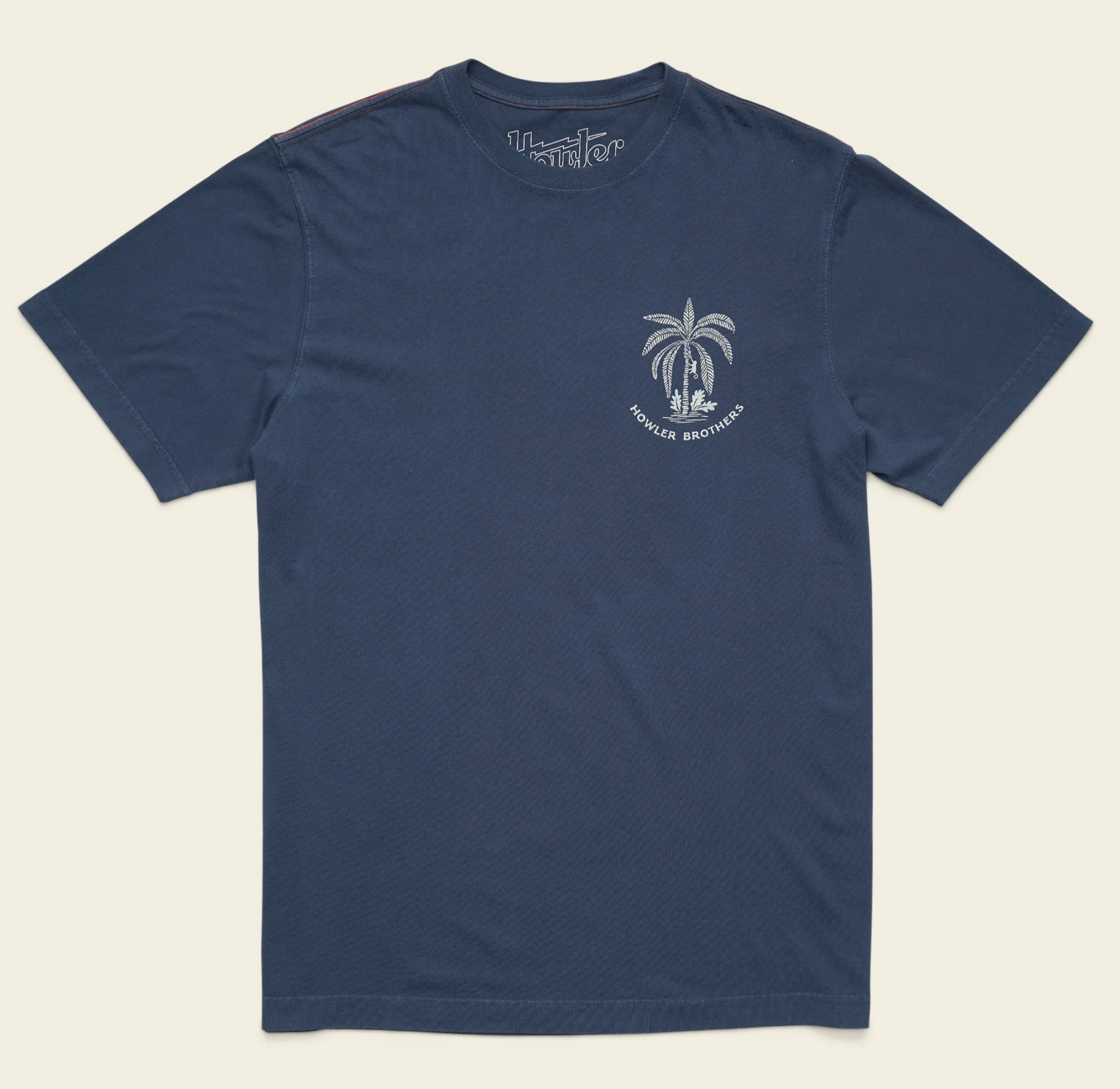 Navy blue t-shirt with a palm tree design and 'Palmers Brothers' text on a beige background