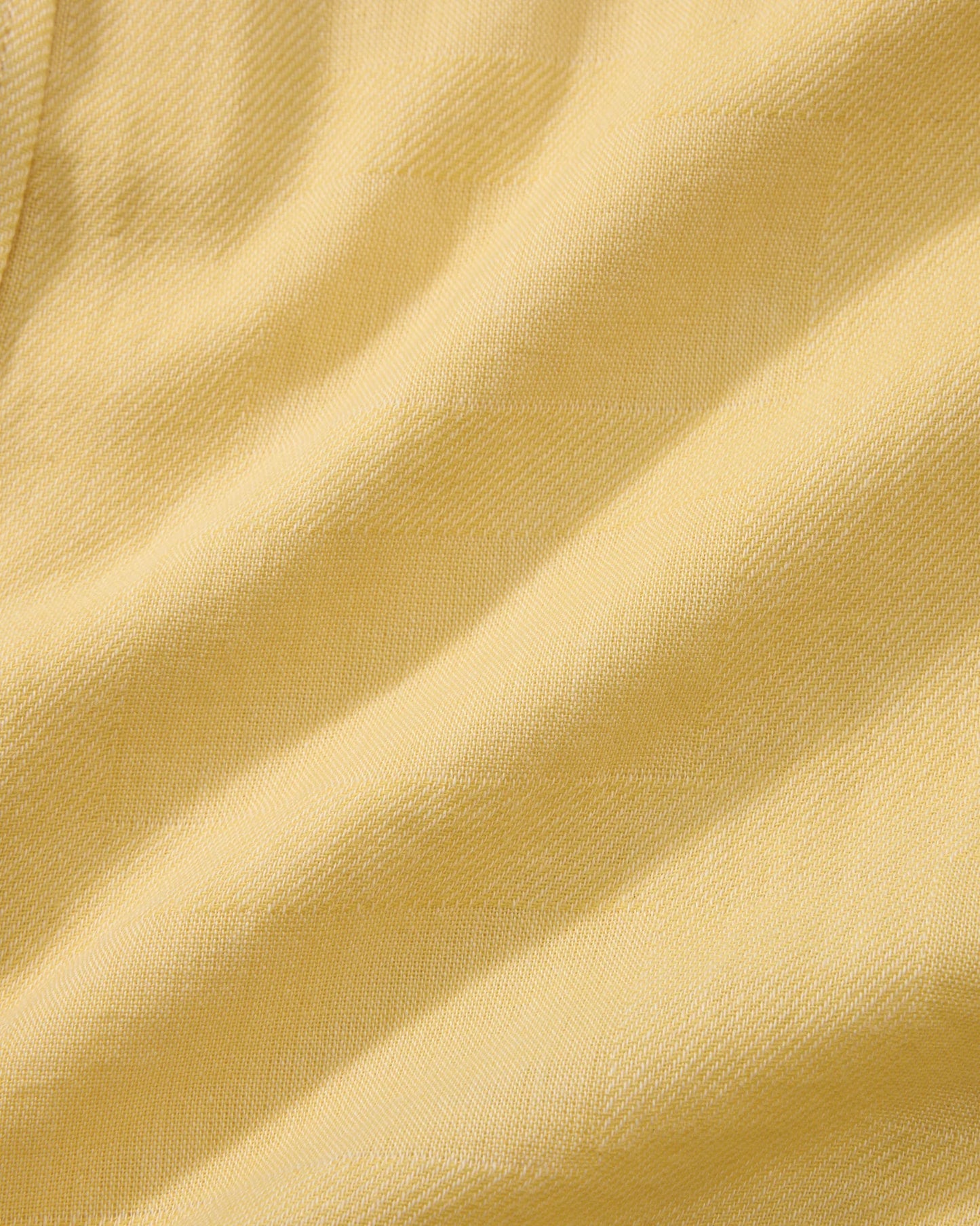 Close-up of beige fabric with folds