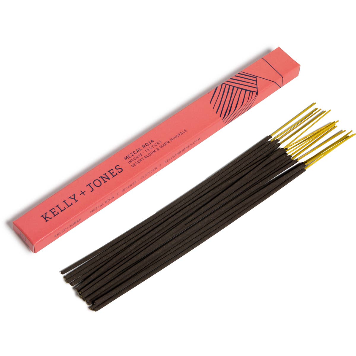 Incense sticks with gold tips and a pink 'Kelly + Jones' box on a white background