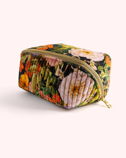 Floral patterned pouch with a zipper on a white background