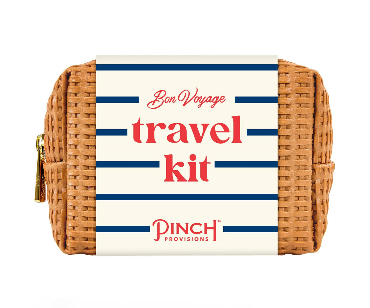 Wicker travel kit with 'Bon Voyage travel kit' label on a white background