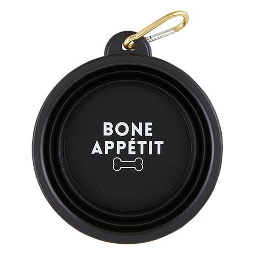 Black pet bowl with 'Bone Appetit' text and gold carabiner on a white background
