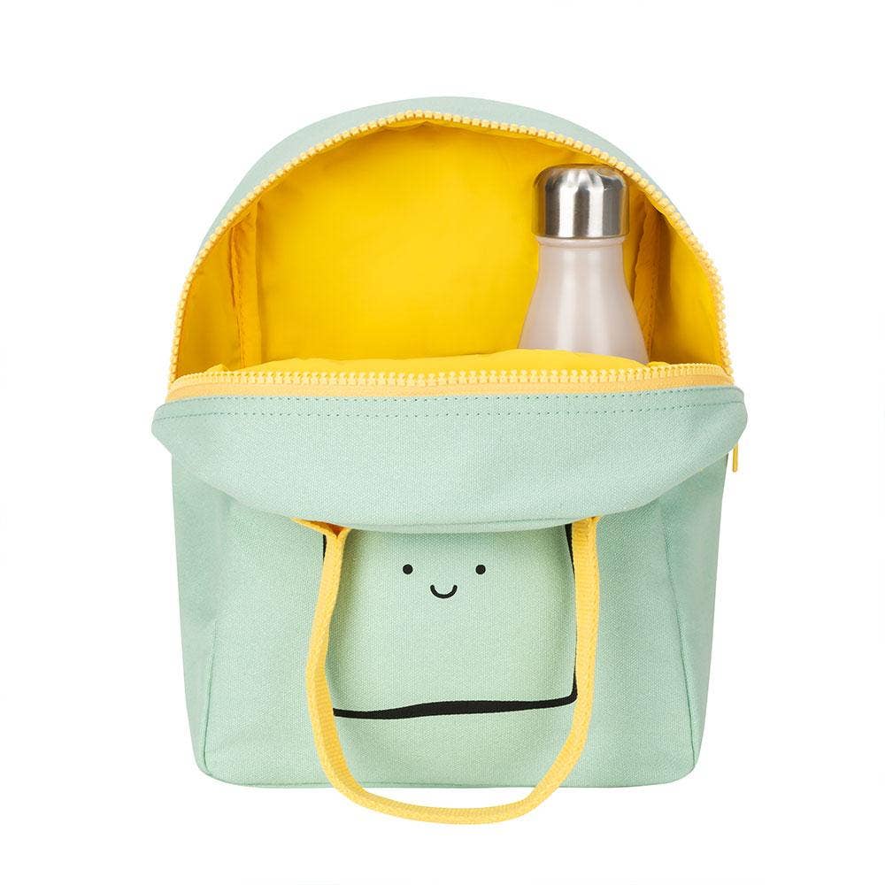 Light green lunch bag with yellow interior and smiley face design, containing a silver water bottle.