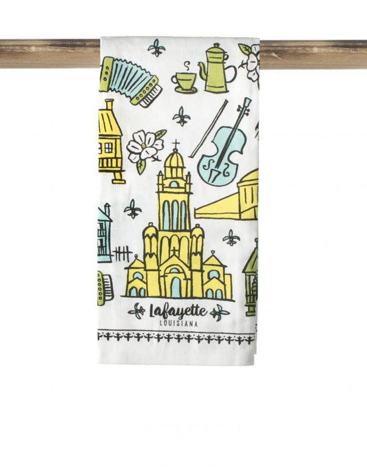 Towel with colorful illustrations of a cathedral and other landmarks on a white background