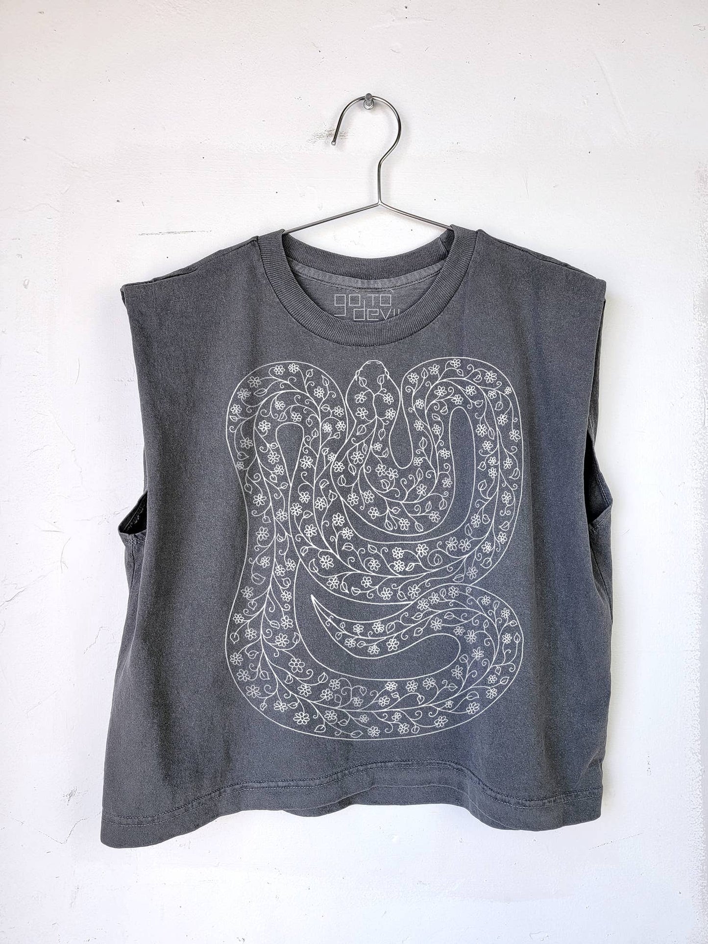 Gray sleeveless shirt with snake design on a white background