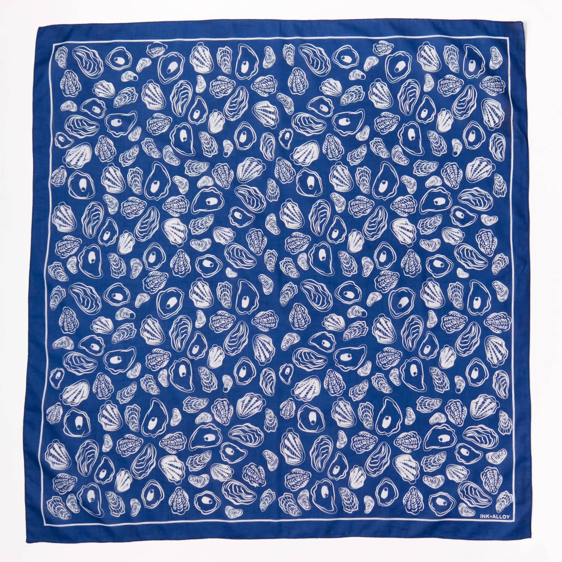 Blue square scarf with white shell pattern
