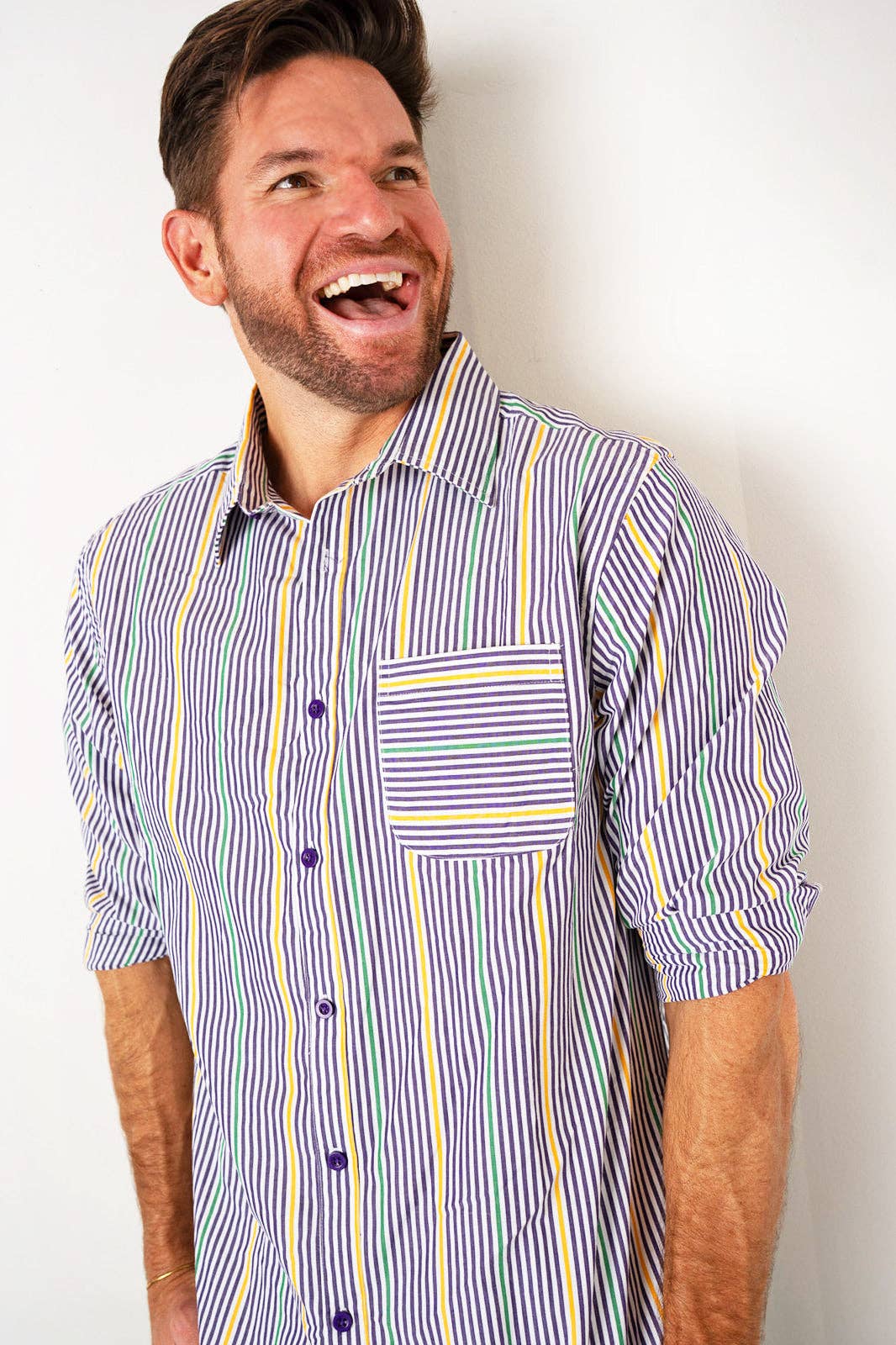 Man wearing a striped shirt with a white background