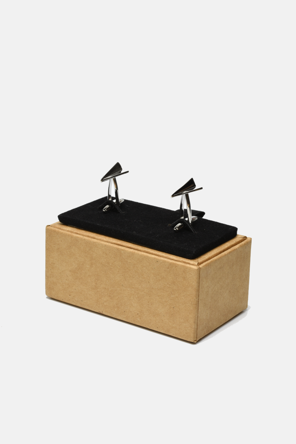 Small wooden box with black felt interior and two black bird figurines on a white background
