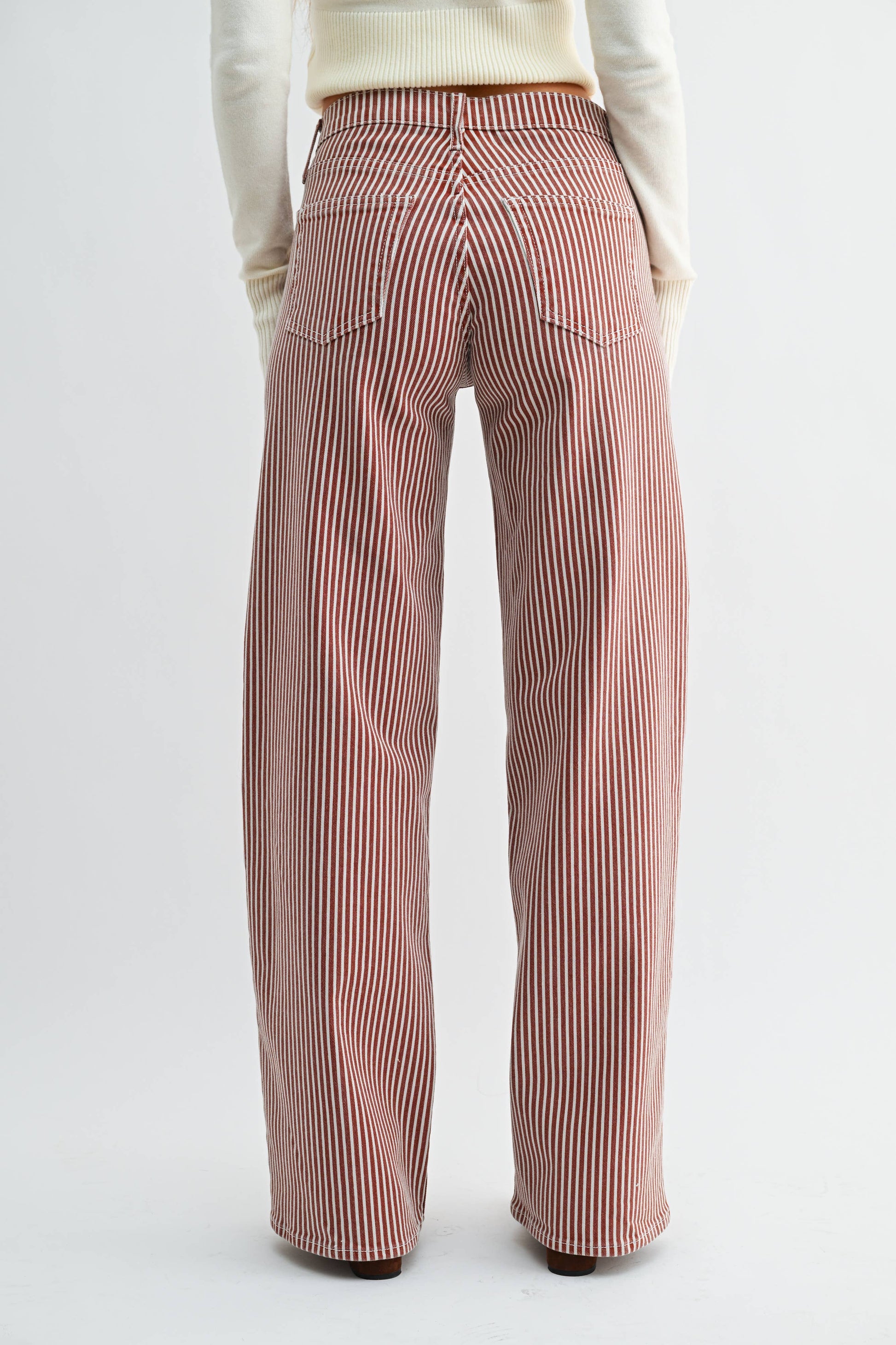 Red and white striped pants on a white background