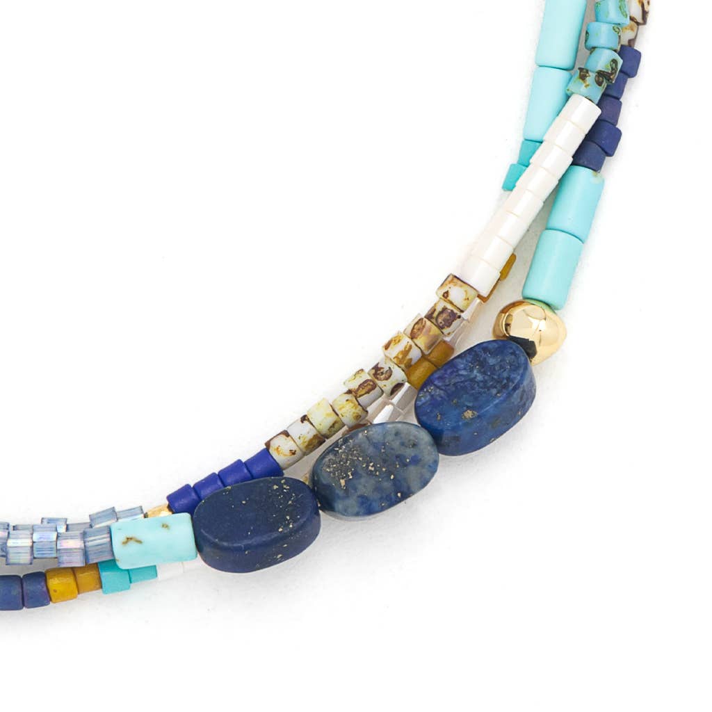 Multicolored beaded necklace on a white background