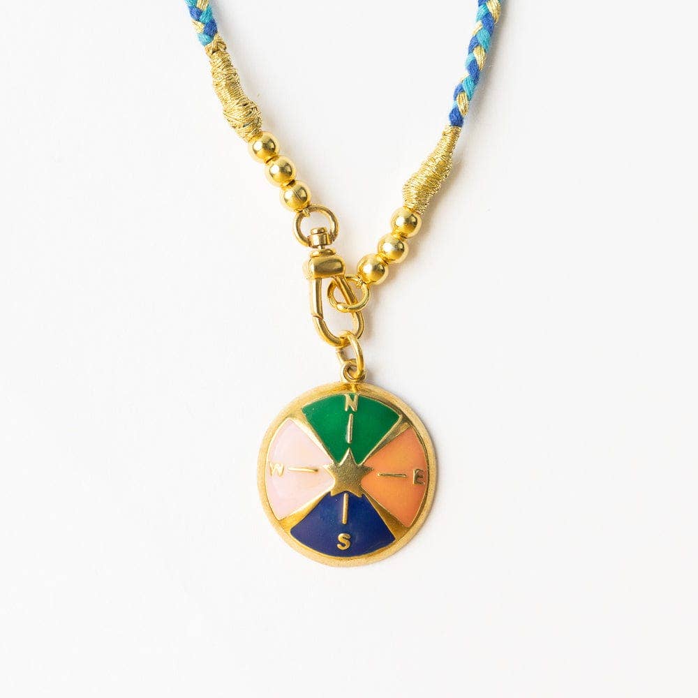 Necklace with a colorful pendant on a white background