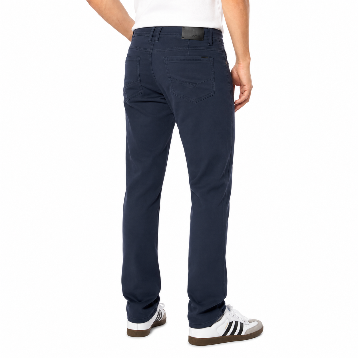 Navy pants worn by a person on a white background